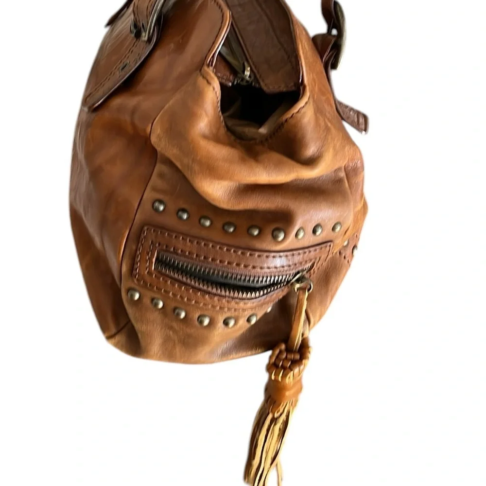 Capacciou large brown Leather bag  side zip pockets 2  long leather tassels
